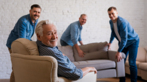 3 sons moving furniture to help their 80 year old father who has Dementia